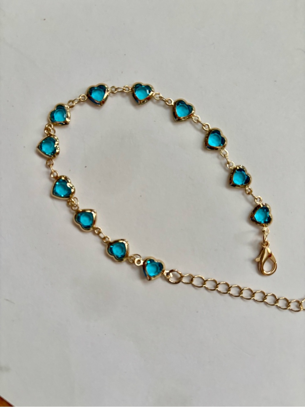 Gold-Plated Bracelet with Blue Heart Gemstones
